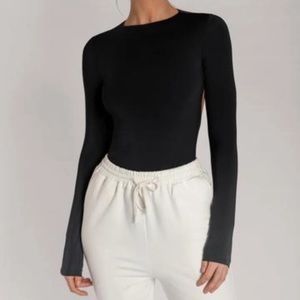 NWT Meshki black cut out back thong Long sleeve bodysuit